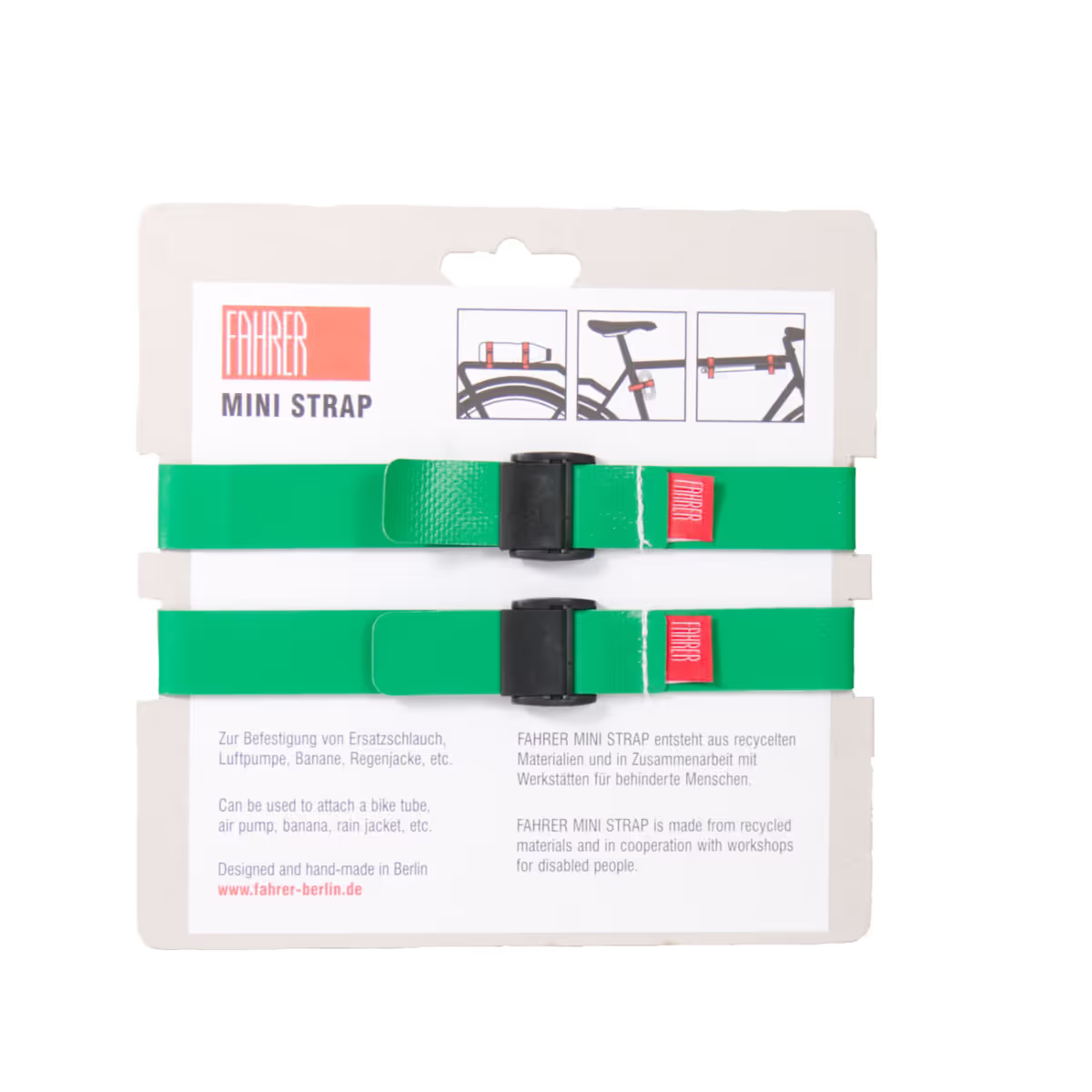 2 grüne Mini Strap Spanngurte mit Verpackung von Fahrer Berlin