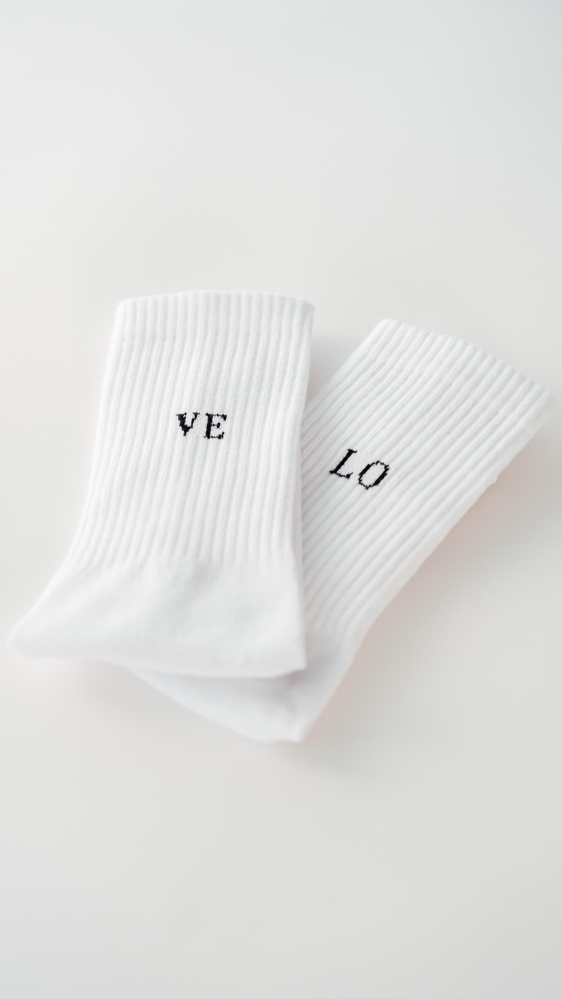 Socken Fairtrade weiß mit VELO Stick