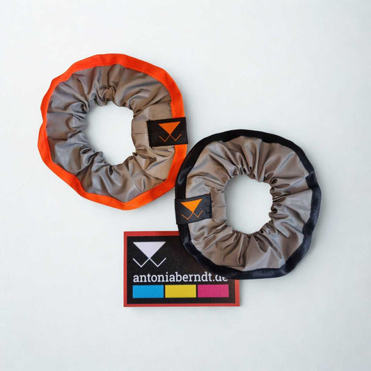 Reflexarmbänder von antoniaberndt in orange oder schwarz