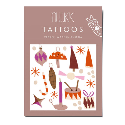 Tattoos von Nuukk mit weihnachtlichen Motiven.